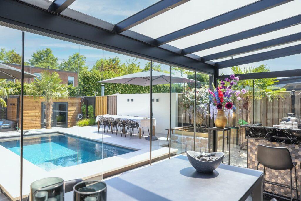Stylish aluminum canopy providing shade for outdoor dining in Wimbledon